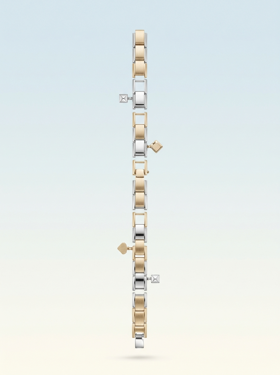 A TENLUMA bracelet shown as a straight vertical sequence of gold and silver modules on a soft light background.